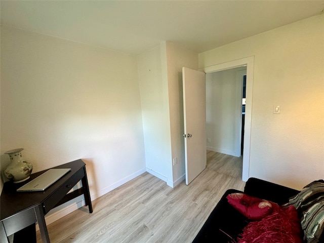 sitting room with light wood-type flooring