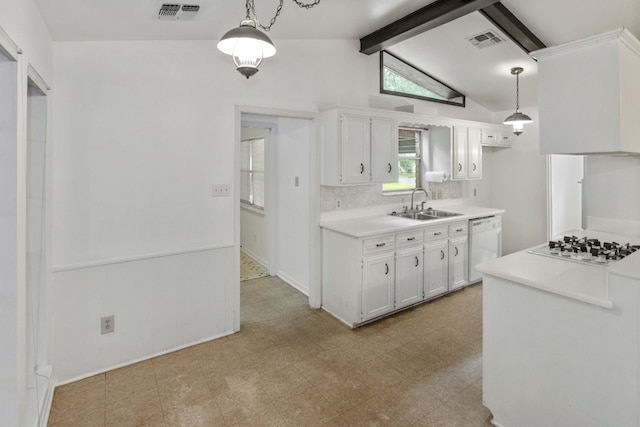 kitchen with white cabinets, vaulted ceiling with beams, pendant lighting, sink, and white appliances