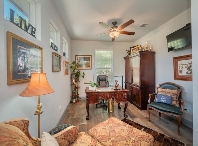 office area featuring light hardwood / wood-style floors and ceiling fan