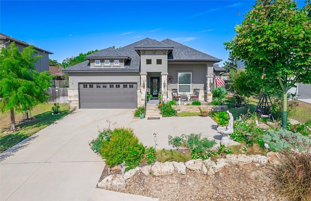 view of front of home with a garage