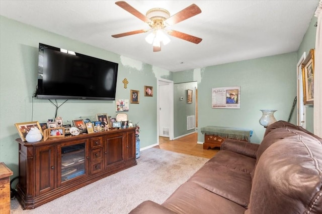 106 Hudgins St, Smithville, TX 78957 - living room with ceiling fan and carpet floors