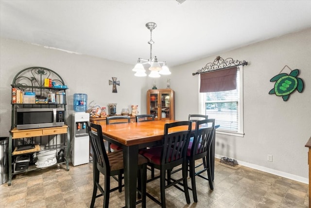 dining area with a chandelier