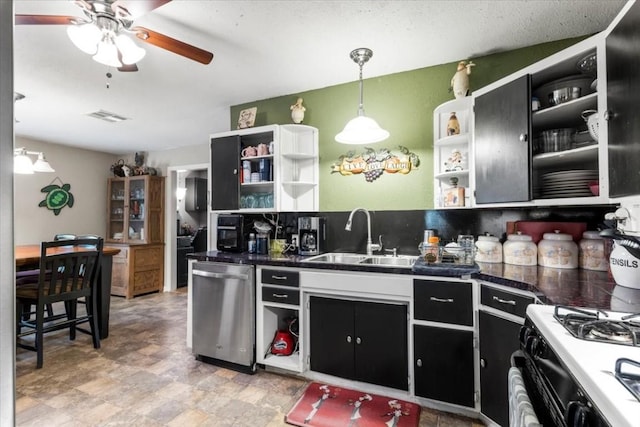 106 Hudgins St, Smithville, TX 78957 - kitchen featuring open shelves, stainless steel dishwasher, and dark cabinetry