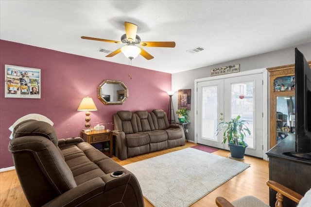 106 Hudgins St, Smithville, TX 78957 - living area with a ceiling fan, wood finished floors, and french doors