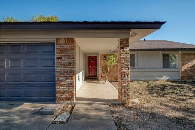 entrance to property with a garage