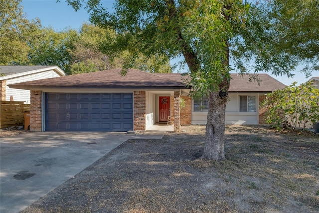 single story home with a garage