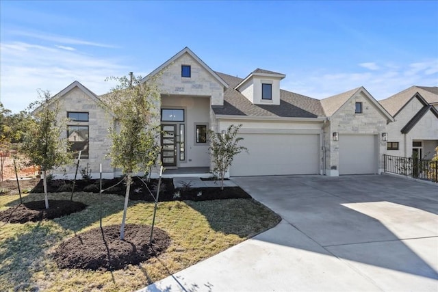 view of front of property featuring a garage