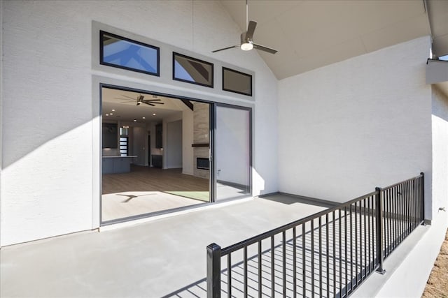 view of patio featuring ceiling fan