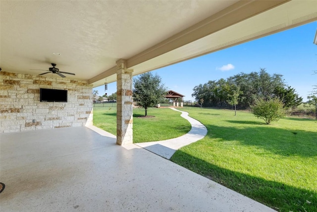 view of patio with a gazebo and a ceiling fan