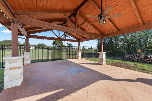 view of patio / terrace featuring a gazebo and ceiling fan