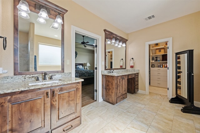 bathroom with vanity and ceiling fan