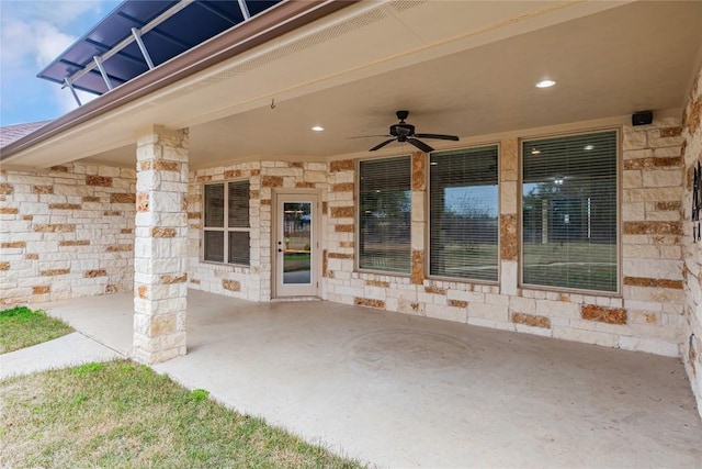 view of patio featuring ceiling fan