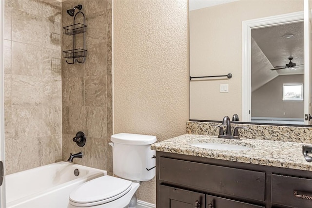 full bath with toilet, a textured wall, washtub / shower combination, and vanity