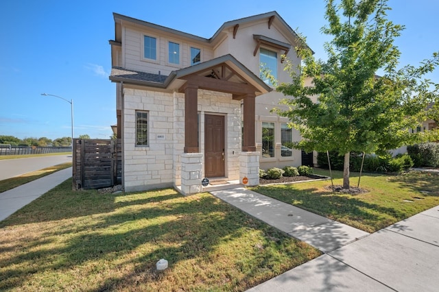 view of front of house with a front lawn