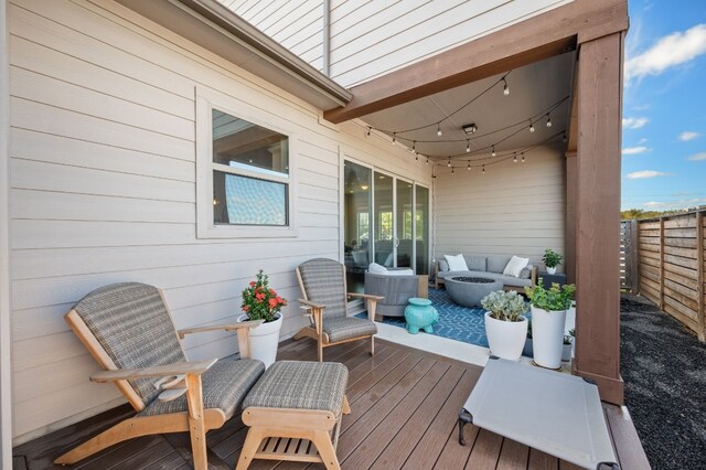 deck featuring outdoor lounge area