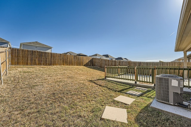 view of yard with central AC