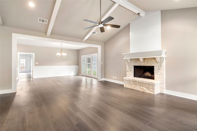 unfurnished living room featuring high vaulted ceiling, dark hardwood / wood-style floors, beamed ceiling, ceiling fan with notable chandelier, and a fireplace