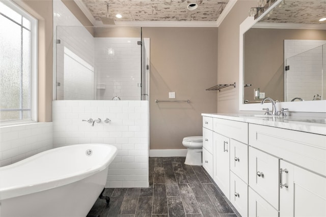 full bathroom with toilet, a healthy amount of sunlight, independent shower and bath, and wood-type flooring