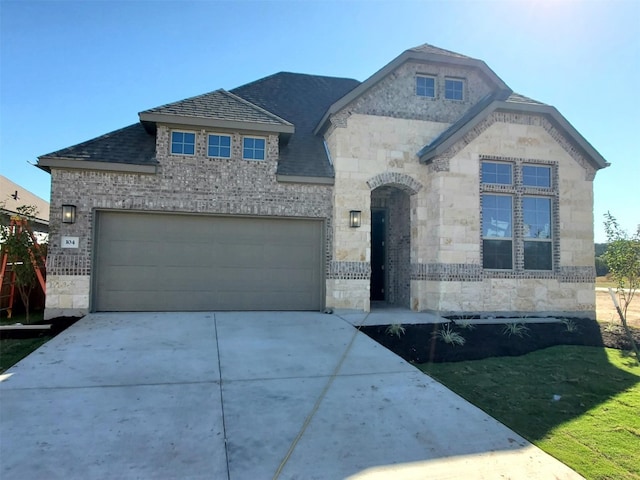 view of front of home featuring a garage