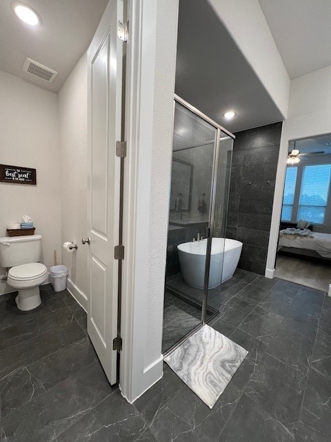 bathroom with toilet, shower with separate bathtub, and ceiling fan