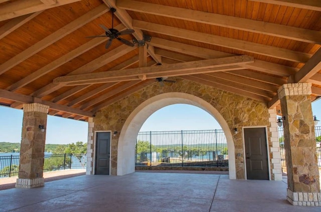 view of home's community featuring a water view and a patio