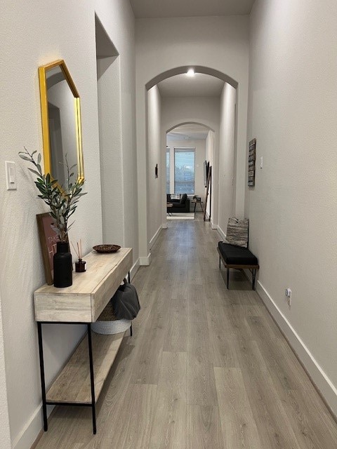 corridor featuring light wood-type flooring