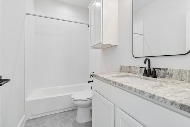 full bathroom featuring vanity, toilet,  shower combination, and tile patterned flooring