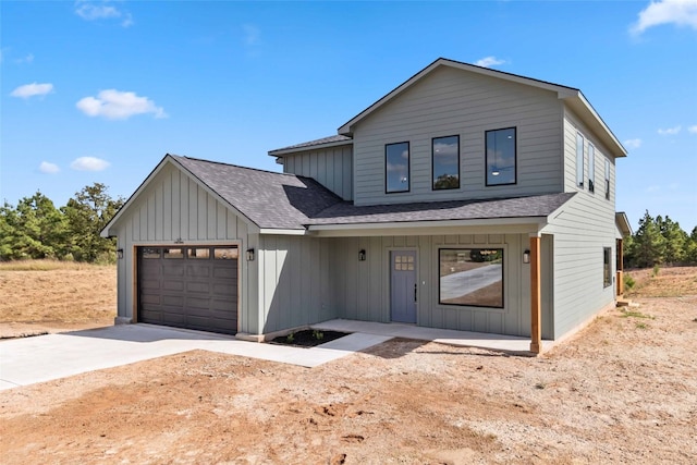 modern farmhouse style home with a garage