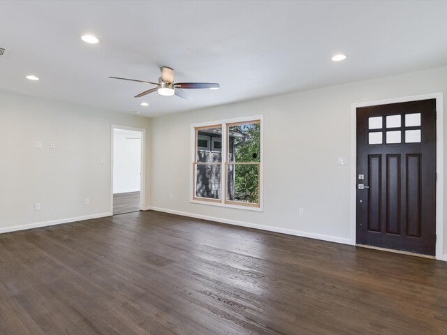 entrance foyer featuring ceiling fan and dark hardwood / wood-style flooring