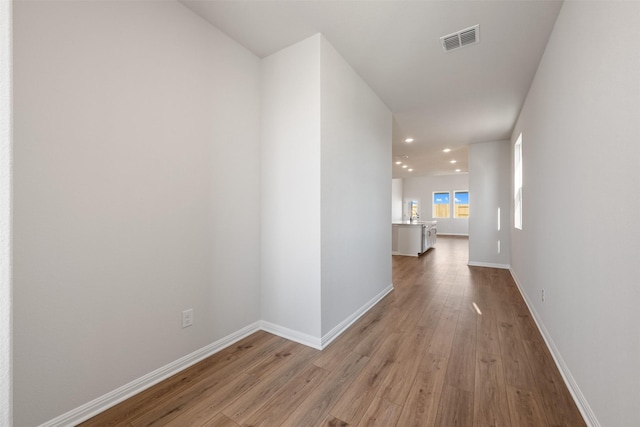 hallway featuring light hardwood / wood-style floors