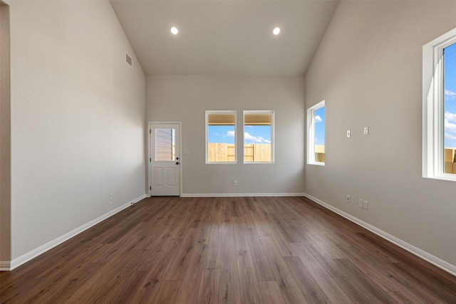 spare room featuring dark hardwood / wood-style flooring