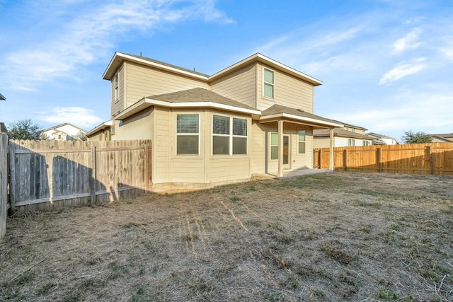 rear view of property with a patio