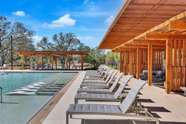 view of swimming pool featuring a patio