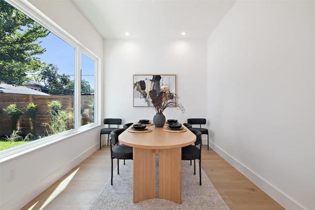 dining space featuring light hardwood / wood-style floors