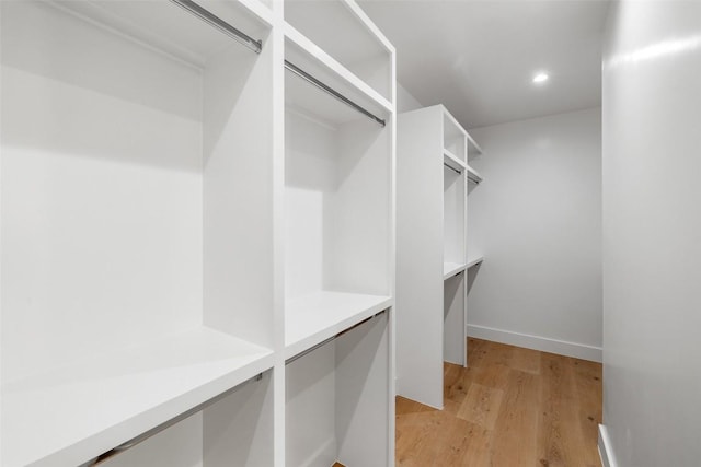 walk in closet featuring light wood-type flooring