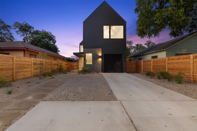 view of front of home with a garage