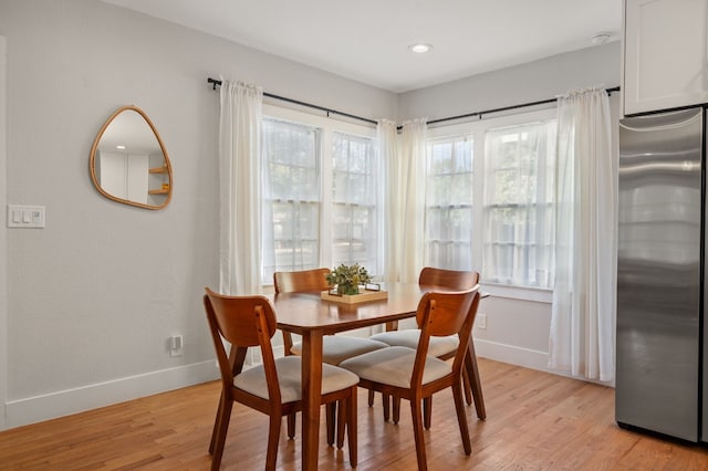 dining room featuring light wood-type flooring