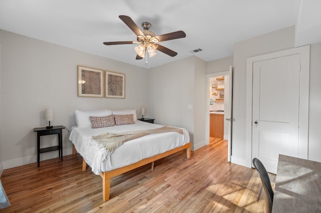 bedroom featuring ceiling fan and light wood-type flooring