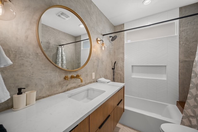 bathroom featuring vanity and shower / bath combination with curtain