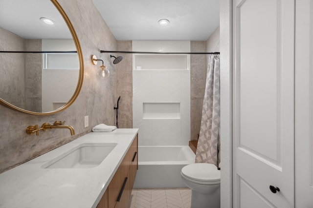 full bathroom with vanity, toilet, shower / bathtub combination with curtain, and a textured ceiling