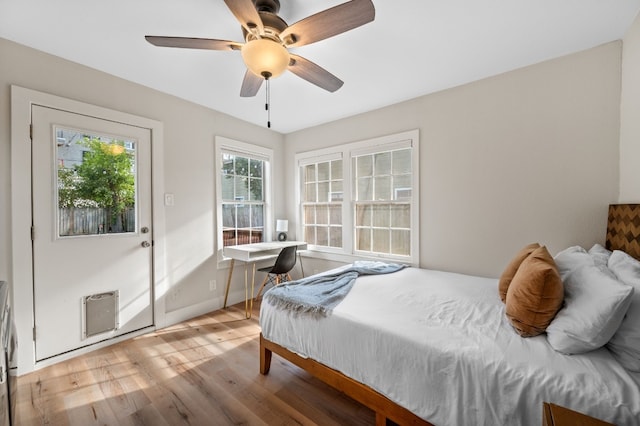 bedroom featuring wood-type flooring and ceiling fan