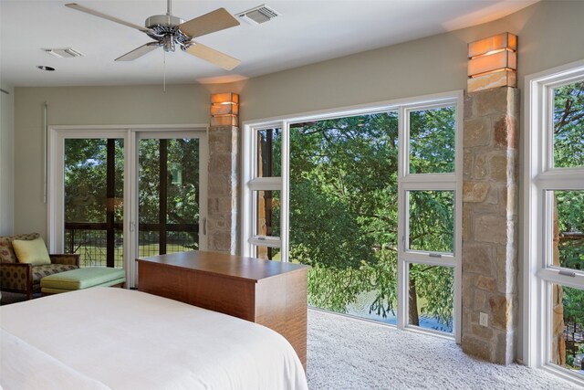 bedroom with ceiling fan, carpet flooring, and access to outside