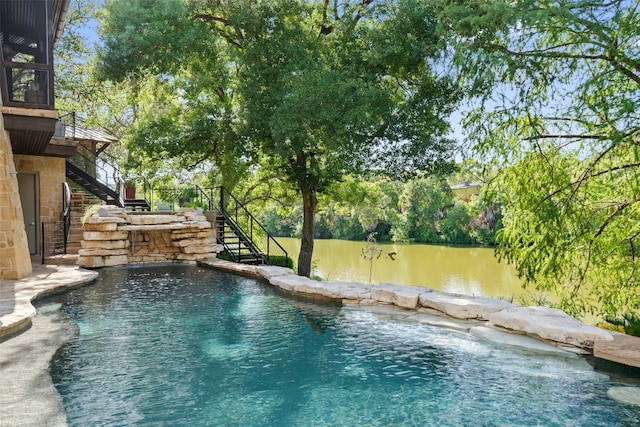 view of pool featuring pool water feature