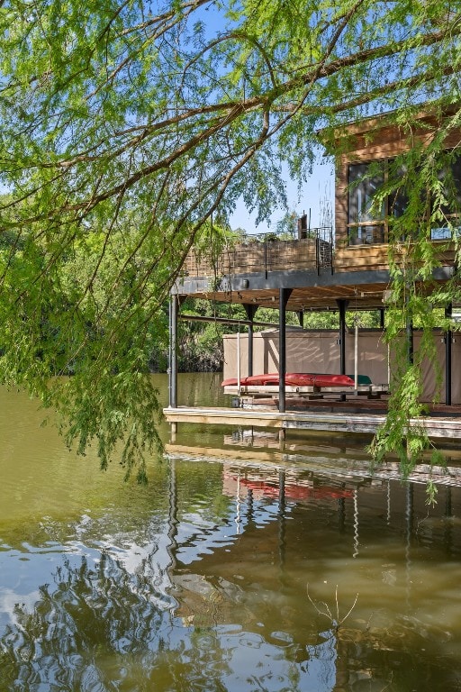 view of dock featuring a water view