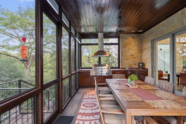 sunroom / solarium with wood ceiling