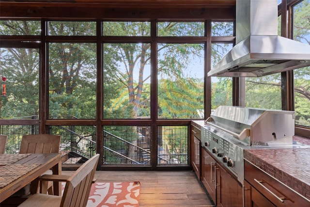 sunroom featuring a wealth of natural light