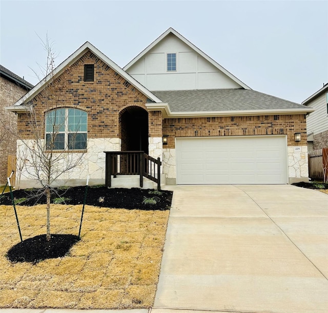 view of front of property featuring a garage