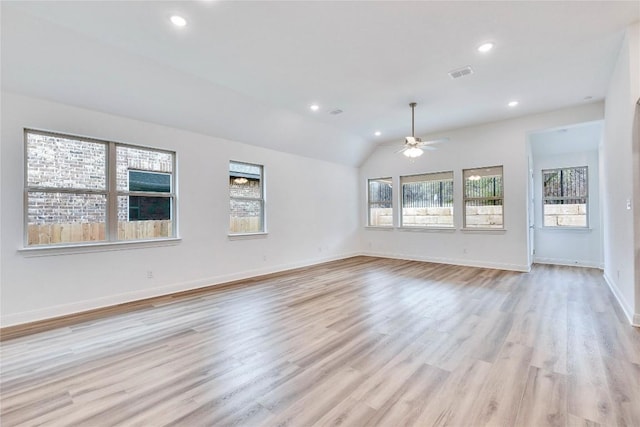 empty room featuring recessed lighting, visible vents, a ceiling fan, light wood-type flooring, and baseboards