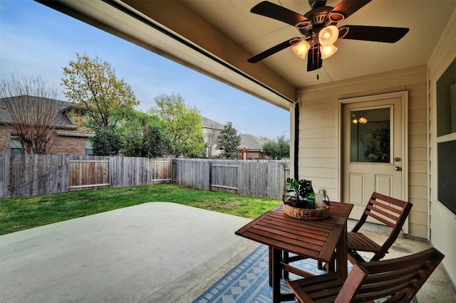 view of patio featuring ceiling fan