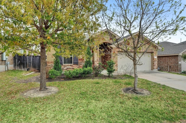 obstructed view of property featuring a front lawn and a garage